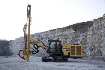 CATERPILLAR TO LAY OFF MORE WORKERS & CUT HOURS